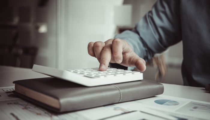 Financial,Businessman,Calculating,Corporate,Income,Tax,Data,And,Analyzing,Charts Financial,Businessman,Calculating,Corporate,Income,Tax,Data,And,Analyzing,Charts